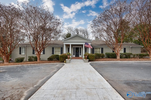 view of front of property featuring a chimney