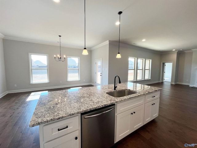 kitchen featuring dark wood-type flooring, a sink, baseboards, open floor plan, and dishwasher