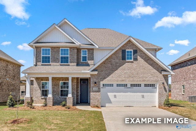 craftsman-style home featuring an attached garage, concrete driveway, roof with shingles, and a front yard