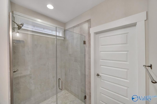 bathroom with a stall shower