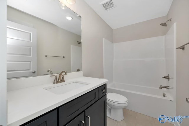 bathroom featuring visible vents, toilet, tile patterned floors, vanity, and  shower combination