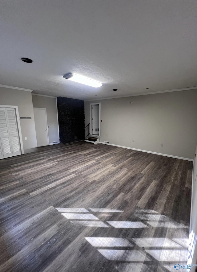 508 Mary St, Centre, AL 35960 - empty room featuring crown molding, baseboards, wood finished floors, and visible vents