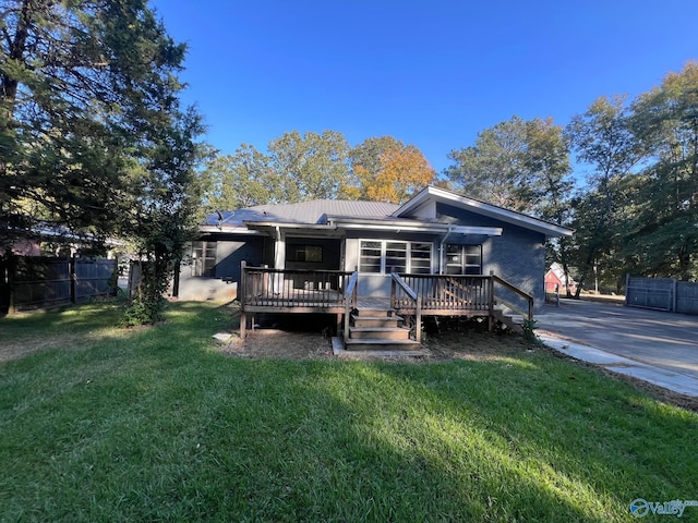 508 Mary St, Centre, AL 35960 - back of house with fence, metal roof, a lawn, and a deck