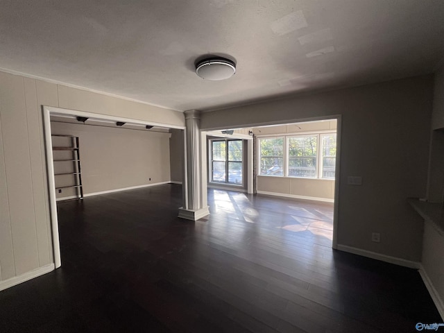 508 Mary St, Centre, AL 35960 - spare room with ornate columns, baseboards, and dark wood-style flooring