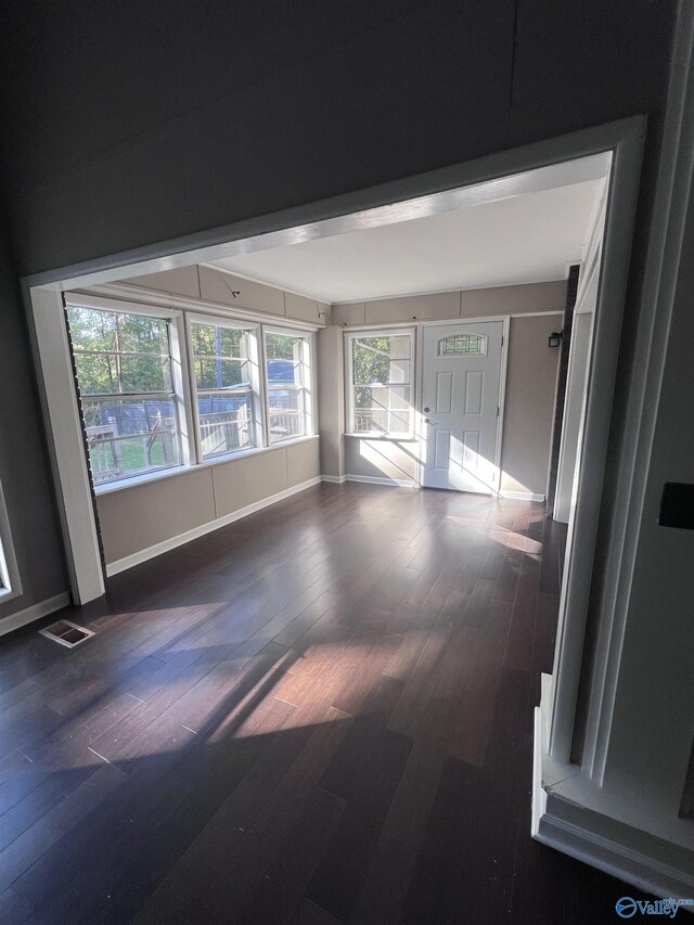 508 Mary St, Centre, AL 35960 - empty room featuring baseboards, visible vents, and dark wood-type flooring