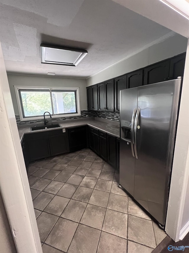 508 Mary St, Centre, AL 35960 - kitchen with dark cabinetry, a wealth of natural light, a sink, and stainless steel fridge with ice dispenser