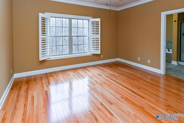 unfurnished room with ceiling fan, ornamental molding, and light hardwood / wood-style flooring