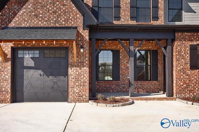 property entrance featuring a garage