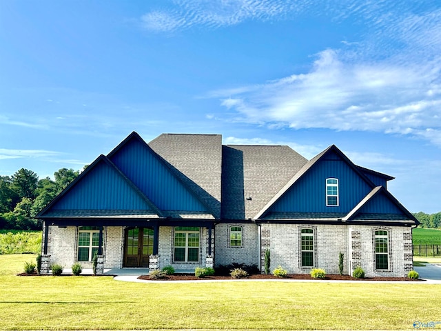 craftsman-style house featuring a front lawn