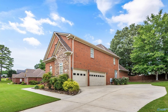 23245 Piney Creek Dr, Athens, AL 35613 - view of side of property featuring brick siding, concrete driveway, and a garage