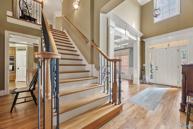 23245 Piney Creek Dr, Athens, AL 35613 - entryway with a towering ceiling, plenty of natural light, stairway, and wood finished floors