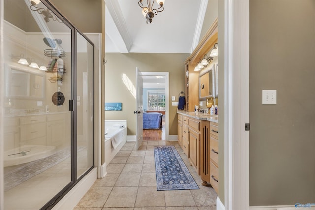 23245 Piney Creek Dr, Athens, AL 35613 - full bath with vanity, a stall shower, a bath, crown molding, and tile patterned flooring