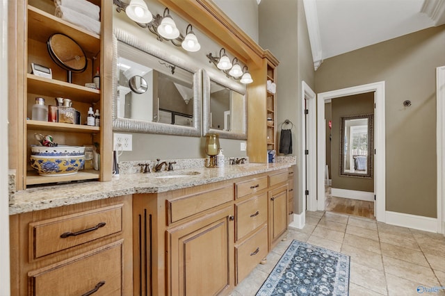 23245 Piney Creek Dr, Athens, AL 35613 - full bathroom featuring double vanity, tile patterned floors, and baseboards
