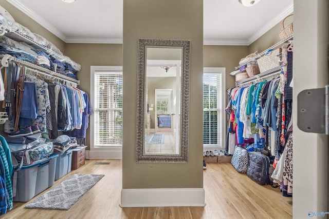23245 Piney Creek Dr, Athens, AL 35613 - walk in closet featuring wood finished floors