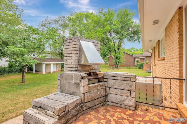 view of patio with an outdoor structure