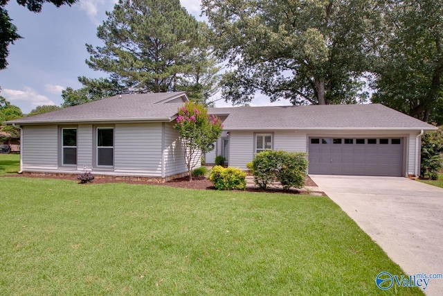 1908 Spanish Oaks Dr SE, Huntsville, AL 35803 - ranch-style home featuring an attached garage, driveway, and a front lawn