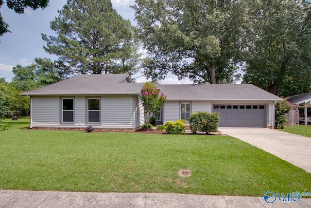 1908 Spanish Oaks Dr SE, Huntsville, AL 35803 - view of front of property featuring a garage, concrete driveway, a front lawn, and a shingled roof