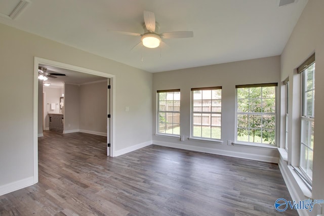 1908 Spanish Oaks Dr SE, Huntsville, AL 35803 - empty room with ceiling fan and dark wood-style floors