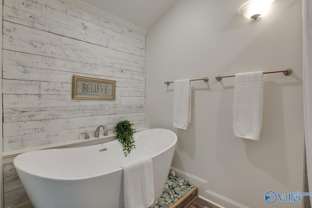 1908 Spanish Oaks Dr SE, Huntsville, AL 35803 - full bathroom with wooden walls and a freestanding tub
