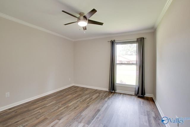 1908 Spanish Oaks Dr SE, Huntsville, AL 35803 - spare room with wood finished floors, ornamental molding, and a ceiling fan