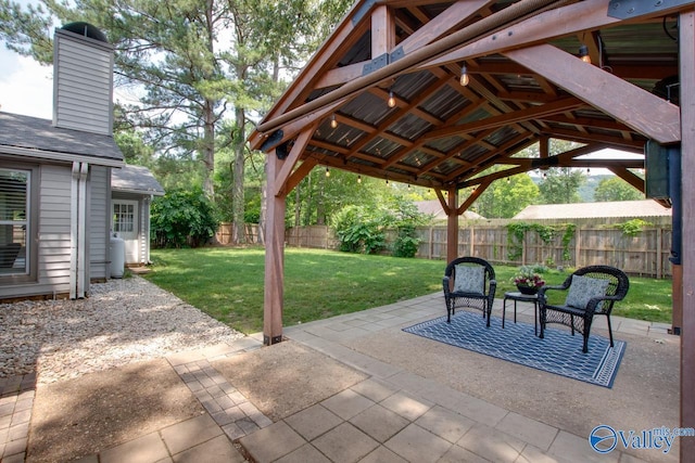 1908 Spanish Oaks Dr SE, Huntsville, AL 35803 - fenced backyard with a patio and a gazebo