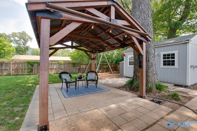 1908 Spanish Oaks Dr SE, Huntsville, AL 35803 - fenced backyard with a patio, an outbuilding, and a gazebo