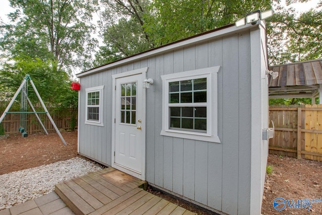 1908 Spanish Oaks Dr SE, Huntsville, AL 35803 - view of outdoor structure with a fenced backyard and a playground