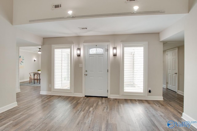 1908 Spanish Oaks Dr SE, Huntsville, AL 35803 - entrance foyer with wood finished floors and a ceiling fan