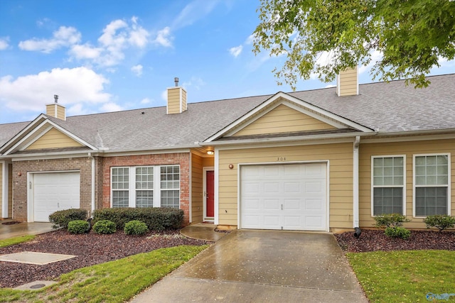 view of front of home with a garage