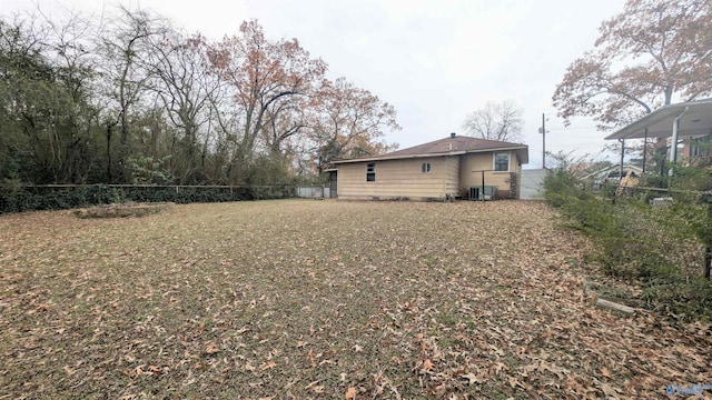 view of yard with central AC unit