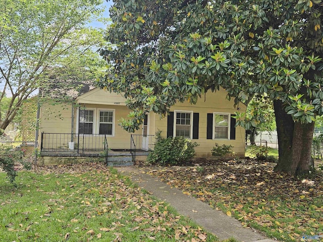 view of front of home with fence
