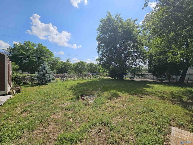 view of yard with fence