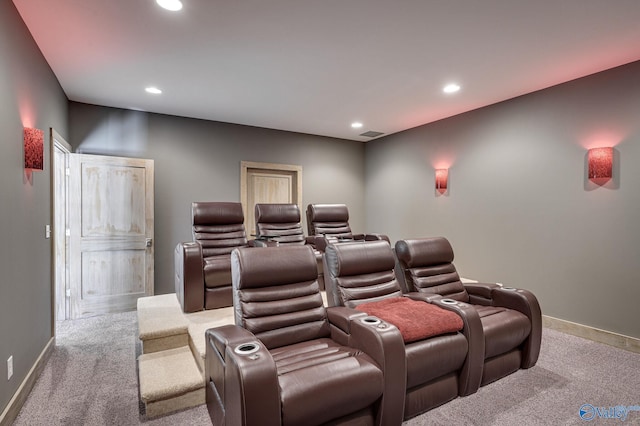 carpeted cinema with baseboards and recessed lighting