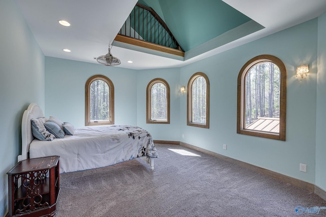 carpeted bedroom with baseboards and recessed lighting