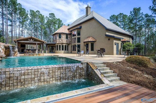 pool featuring a patio area