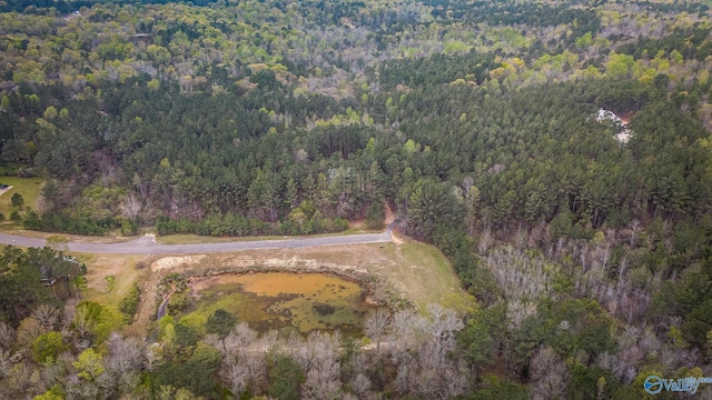 aerial view featuring a view of trees