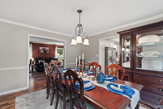 471 Oak Trl NE, Hartselle, AL 35640 - dining area with dark wood-style floors, crown molding, and baseboards