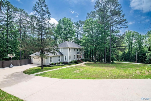 471 Oak Trl NE, Hartselle, AL 35640 - colonial house with concrete driveway and a garage