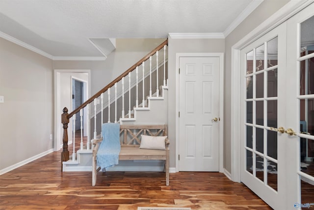 471 Oak Trl NE, Hartselle, AL 35640 - entrance foyer with ornamental molding, wood finished floors, stairs, baseboards, and french doors
