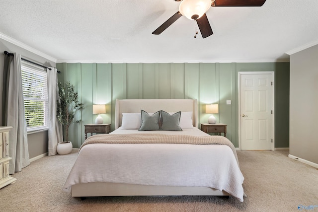 471 Oak Trl NE, Hartselle, AL 35640 - carpeted bedroom featuring crown molding, baseboards, a ceiling fan, and a textured ceiling