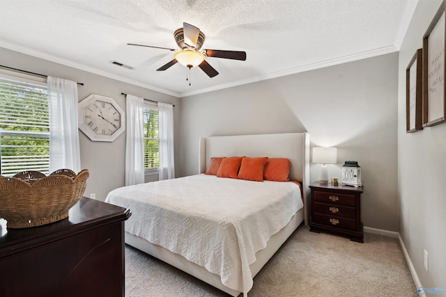 471 Oak Trl NE, Hartselle, AL 35640 - bedroom featuring light carpet, ornamental molding, baseboards, ceiling fan, and a textured ceiling