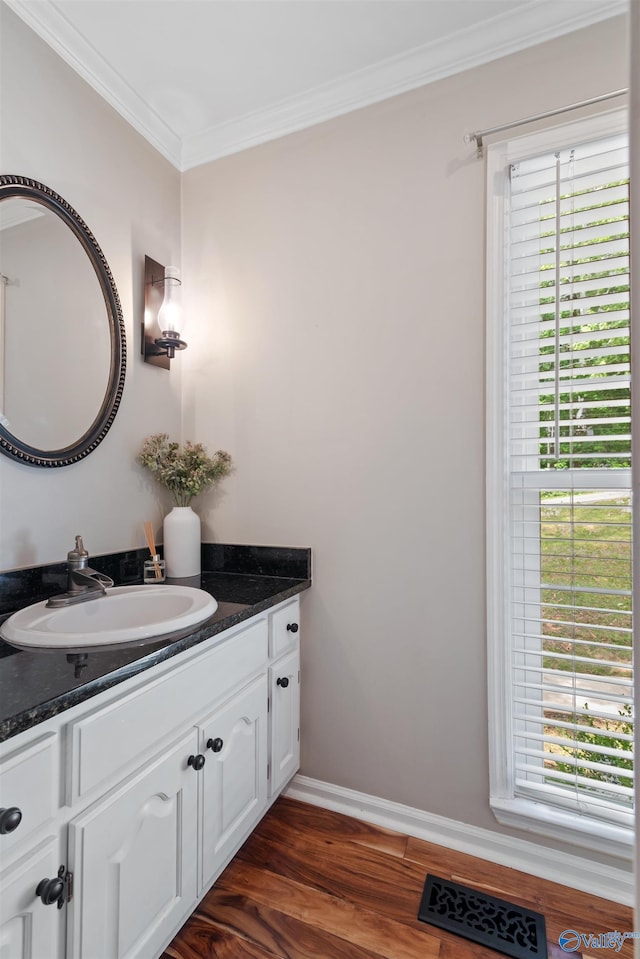 471 Oak Trl NE, Hartselle, AL 35640 - bathroom featuring ornamental molding, wood finished floors, baseboards, and vanity