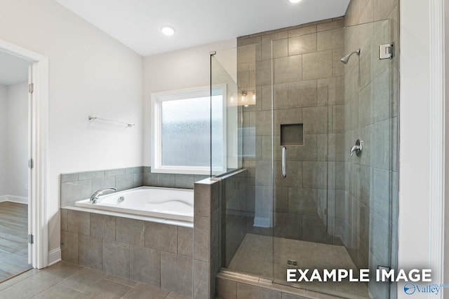 2000 Austin Dr NE, Cullman, AL 35058 - full bath featuring a shower stall, a bath, and tile patterned floors