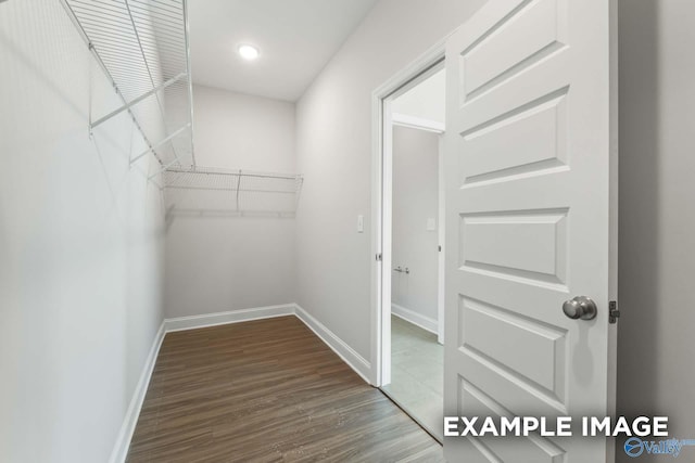 2000 Austin Dr NE, Cullman, AL 35058 - walk in closet with wood finished floors