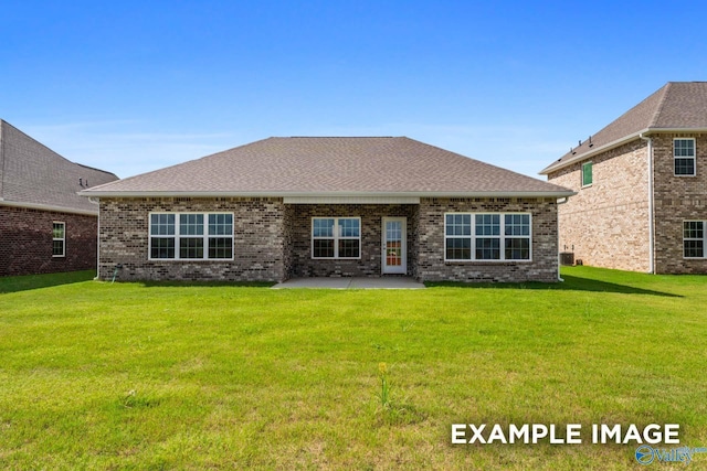 2000 Austin Dr NE, Cullman, AL 35058 - rear view of house featuring a patio, roof with shingles, a yard, central AC, and brick siding