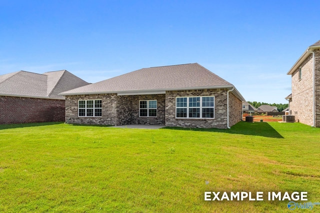 2000 Austin Dr NE, Cullman, AL 35058 - rear view of house with brick siding, a shingled roof, cooling unit, a yard, and a patio