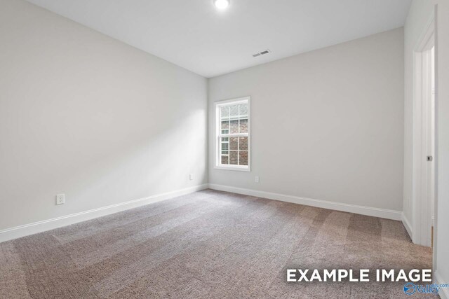 2000 Austin Dr NE, Cullman, AL 35058 - spare room featuring visible vents, carpet, and baseboards