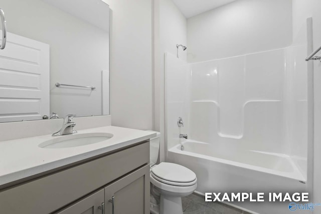 2000 Austin Dr NE, Cullman, AL 35058 - bathroom featuring tile patterned floors, shower / bathtub combination, toilet, and vanity