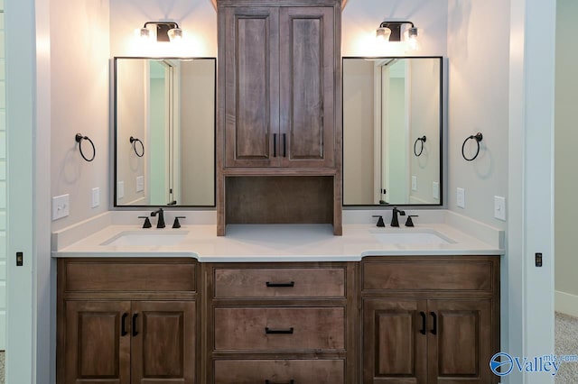 bathroom featuring double vanity