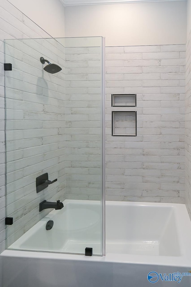 bathroom with washtub / shower combination